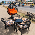 Black Rattan Egg Chair + 4 Rattan Tub Chairs + Round Glass-Top Coffee Table