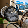 Black Swing Chair with White Cushions