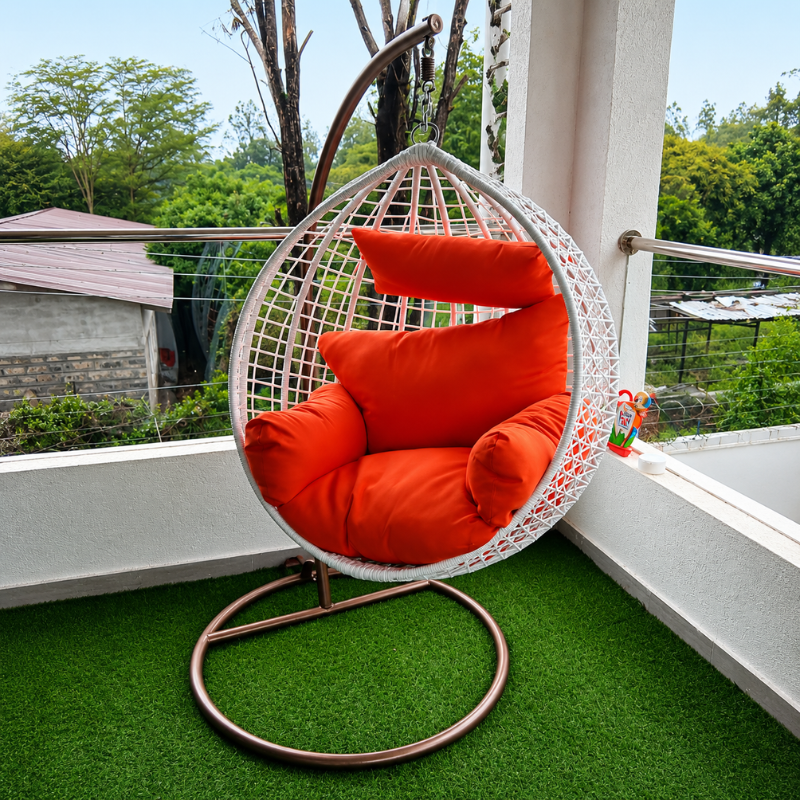 White Swing Chair - Orange Cushions